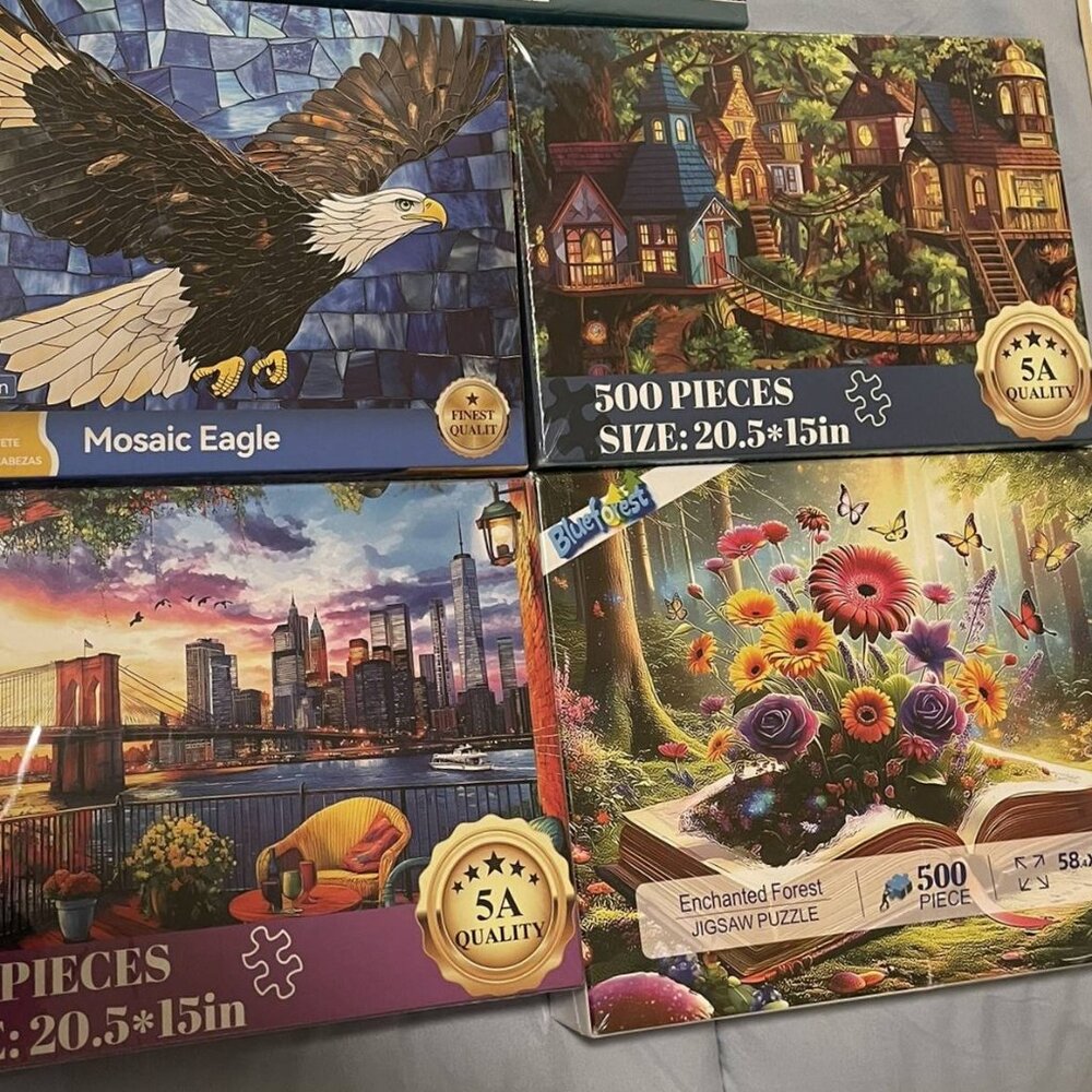 Jigsaw Puzzle Set of 4 /500 piece puzzles with letters on the back.
